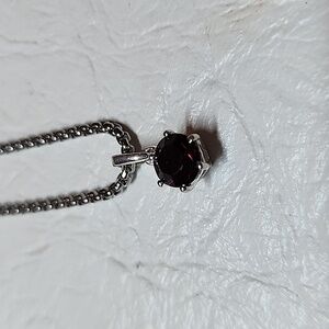 Swarovski Garnet color crystal in silver pendant